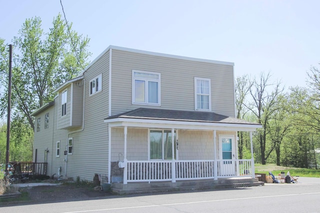 32941 Nature Rd, Foley, MN 56329 - view of front of property with covered porch and roof with shingles