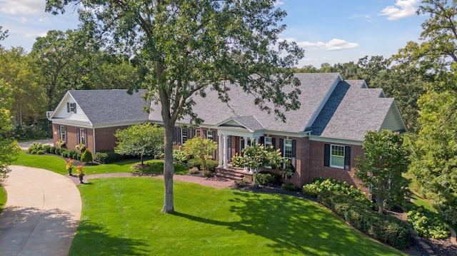 view of front of home with a front lawn