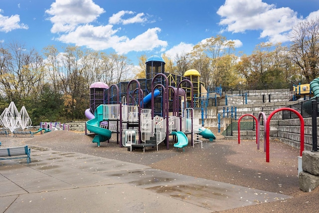 community jungle gym featuring view of scattered trees