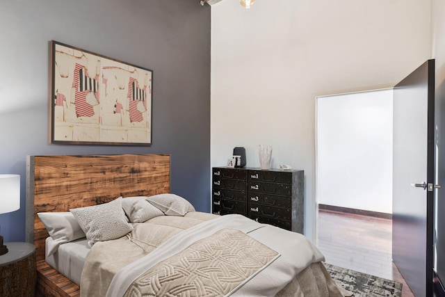 bedroom featuring wood-type flooring