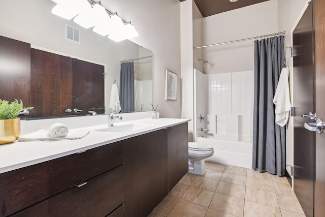 full bathroom with toilet, shower / tub combo, tile patterned floors, and vanity