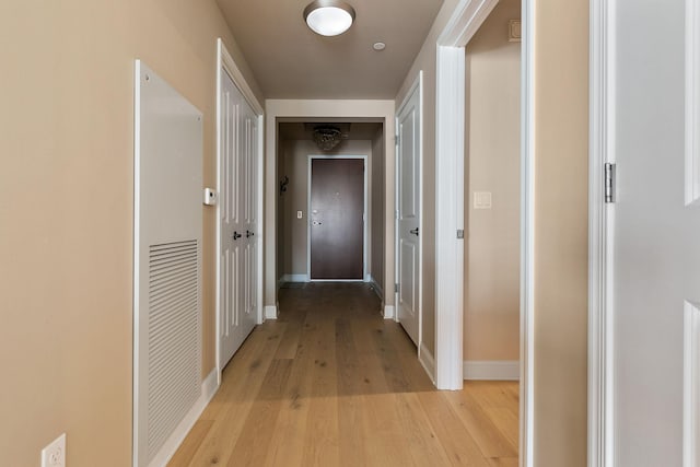 hallway featuring light hardwood / wood-style flooring