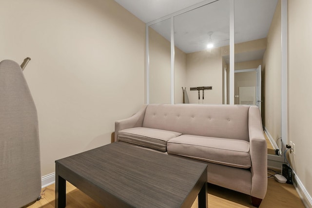 sitting room featuring light hardwood / wood-style flooring