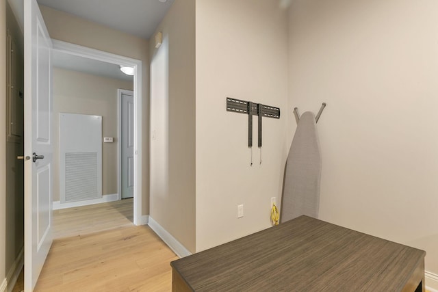 hallway featuring light hardwood / wood-style flooring