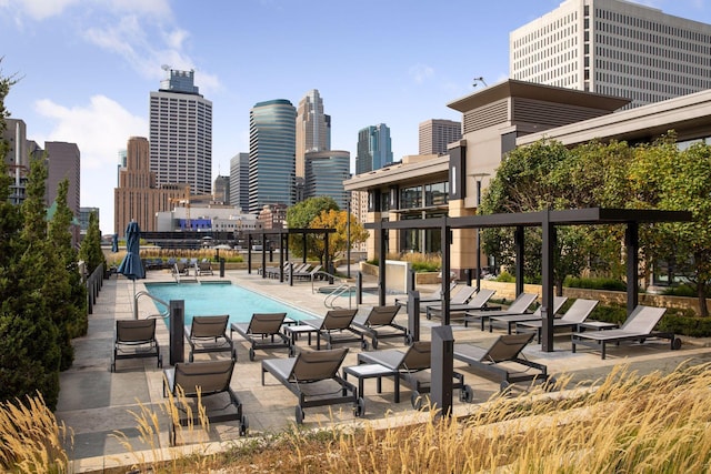 view of swimming pool featuring a patio area