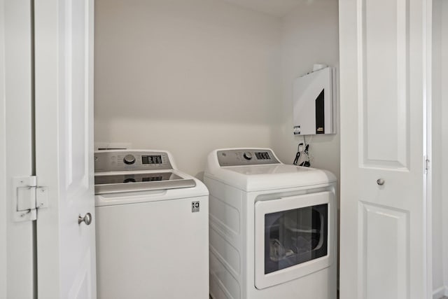 laundry area featuring washing machine and dryer