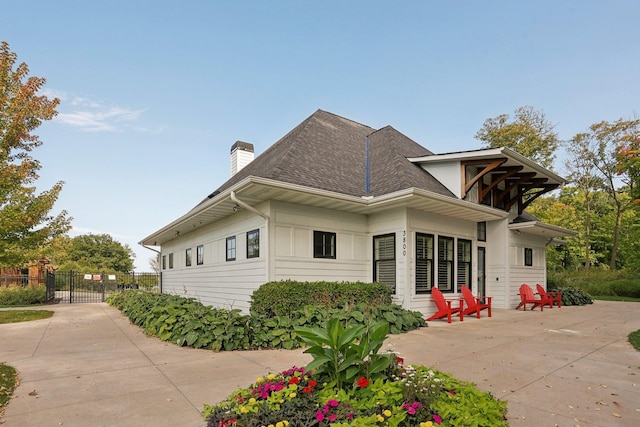 view of property exterior featuring a patio