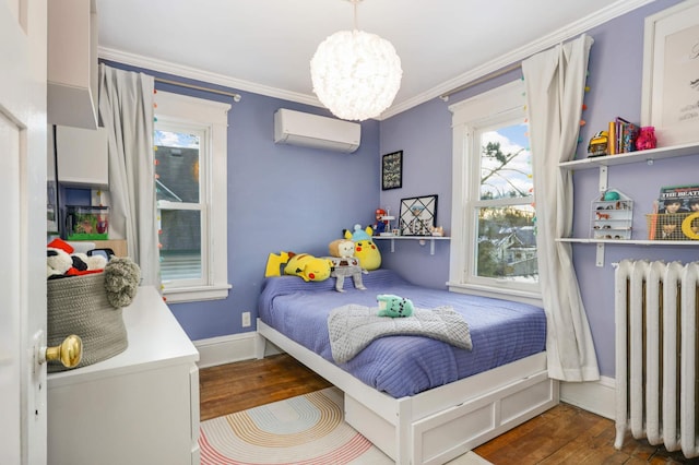 bedroom featuring crown molding, radiator, a wall unit AC, a notable chandelier, and hardwood / wood-style flooring