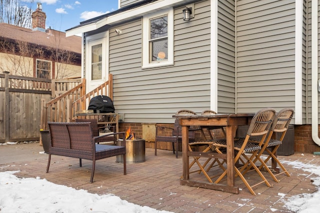 view of snow covered patio