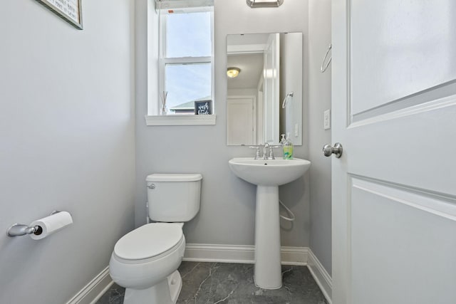 bathroom with sink and toilet