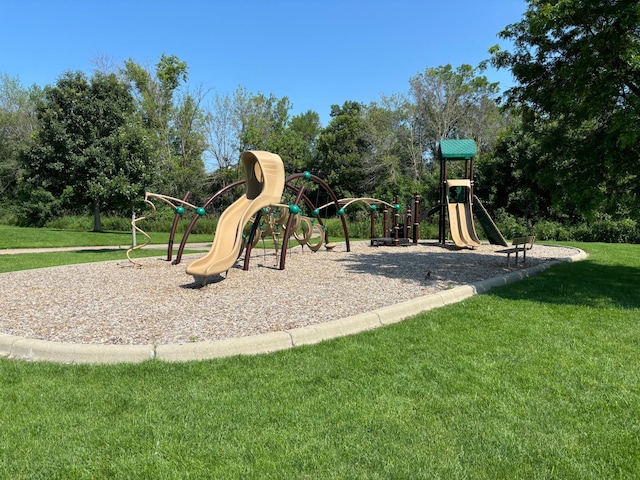 view of play area featuring a lawn