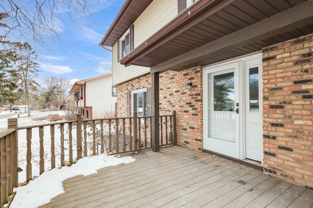 view of snow covered deck