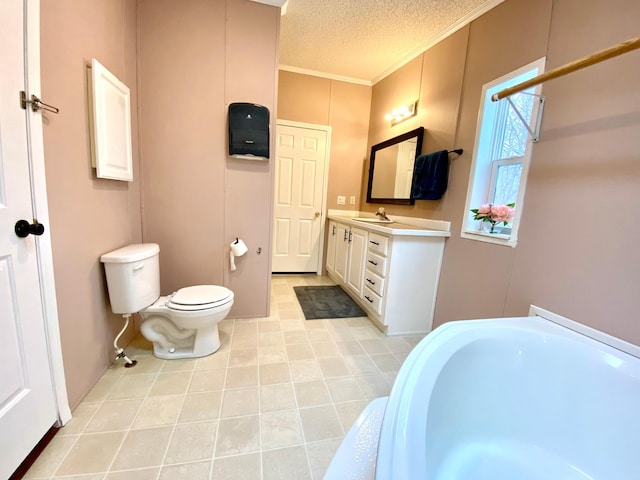 bathroom with a tub to relax in, vanity, ornamental molding, toilet, and a textured ceiling