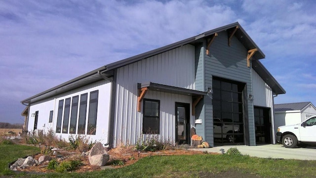 exterior space with driveway and a garage