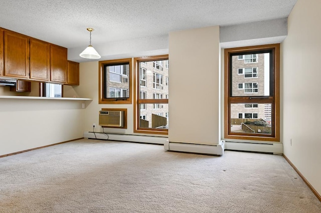 433 7th St Unit 1628, Minneapolis, MN 55415 - unfurnished living room featuring light colored carpet, a wall mounted air conditioner, baseboards, a textured ceiling, and a baseboard radiator