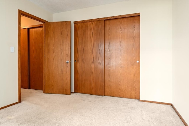 433 7th St Unit 1628, Minneapolis, MN 55415 - unfurnished bedroom featuring carpet flooring and baseboards