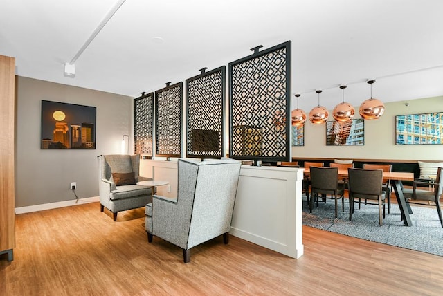 433 7th St Unit 1628, Minneapolis, MN 55415 - sitting room with wood finished floors and baseboards