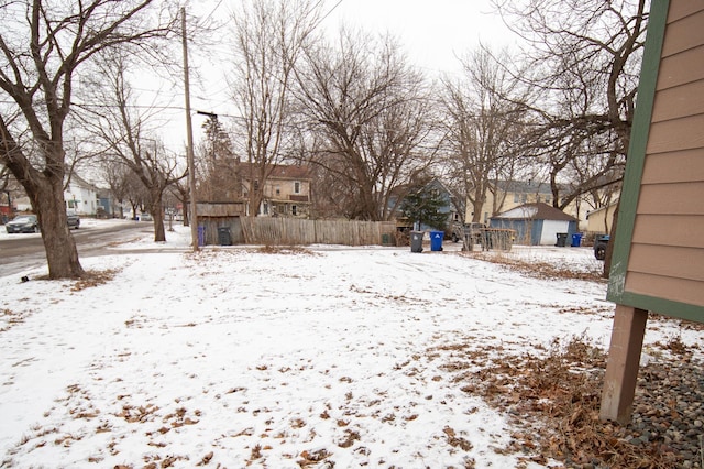 view of yard covered in snow