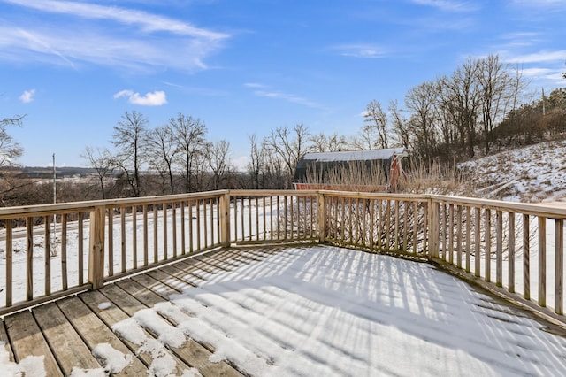 view of snow covered deck