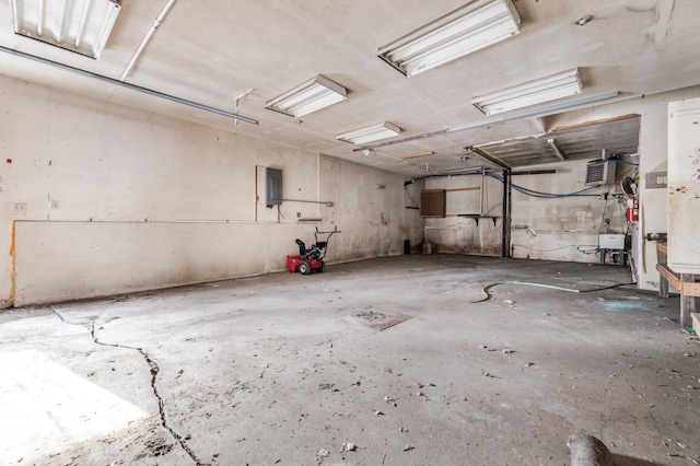 interior space with sink and electric panel