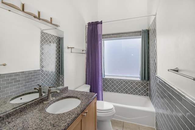 full bathroom with vanity, toilet, washtub / shower combination, and tile patterned flooring