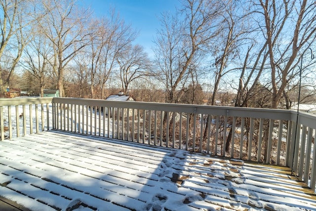 view of snow covered deck