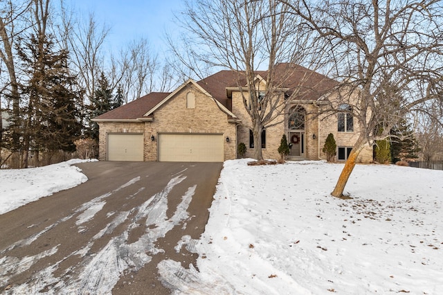 view of front of property with a garage