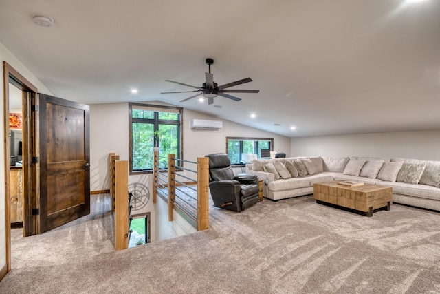 living room with carpet flooring, lofted ceiling, and a wall unit AC