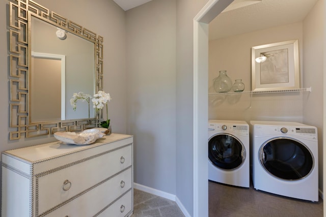 laundry room featuring washer and dryer