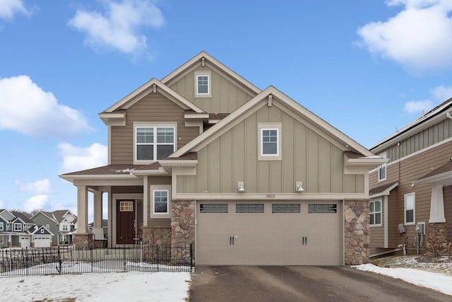 craftsman house with a garage