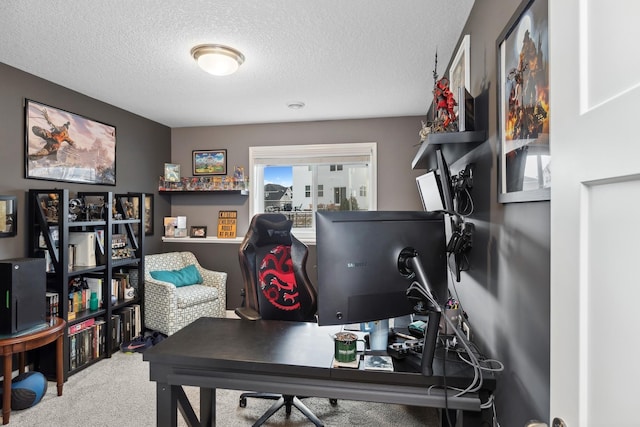 carpeted home office with a textured ceiling