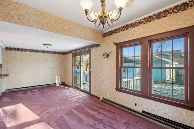 spare room with ornamental molding, carpet, a baseboard heating unit, and a notable chandelier