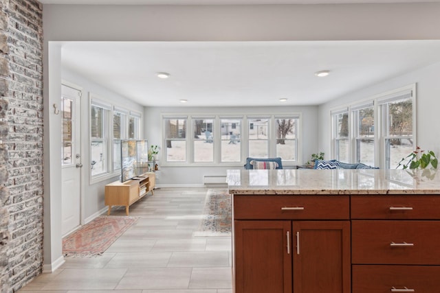 kitchen with light stone countertops