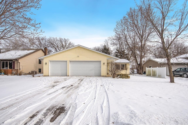 single story home with a garage