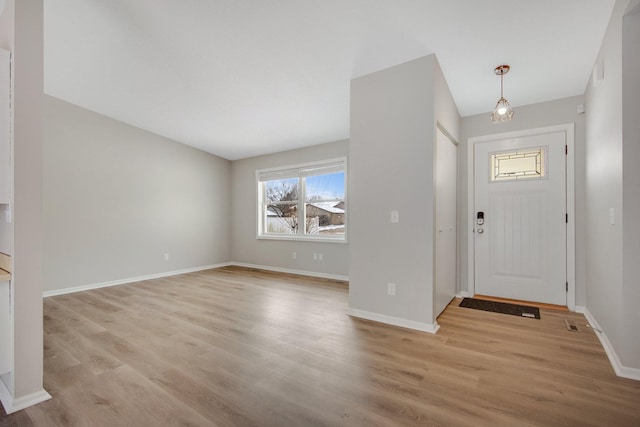 entrance foyer featuring light hardwood / wood-style flooring