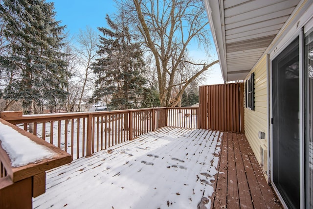 view of snow covered deck