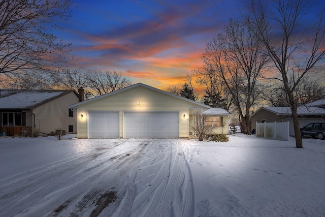 single story home with a garage