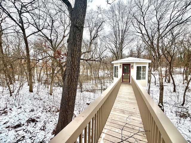 view of snow covered deck