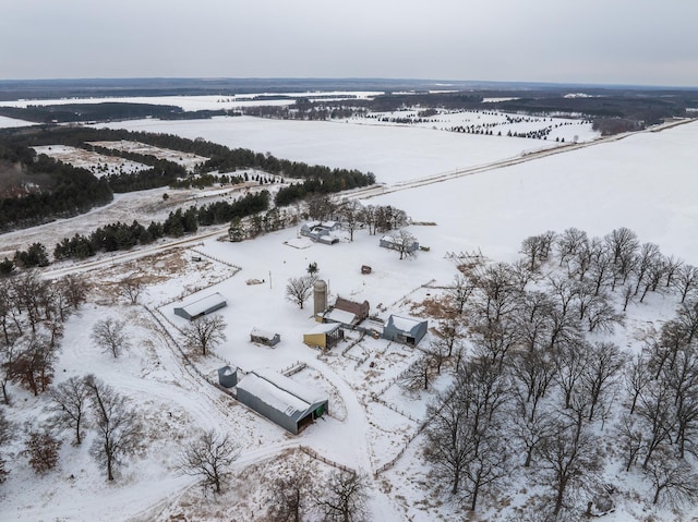 snowy aerial view with a rural view