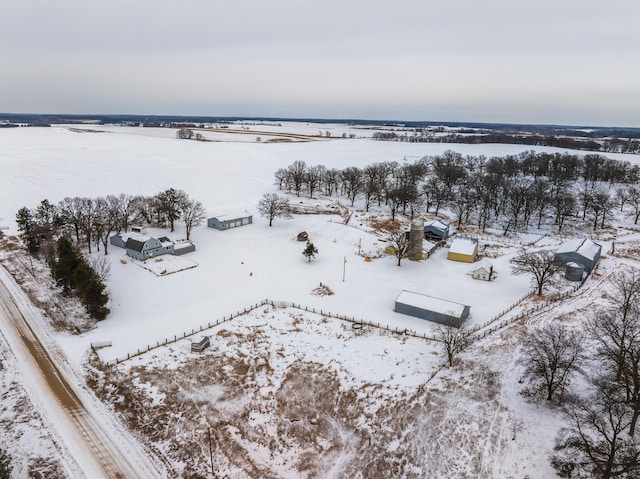 snowy aerial view with a rural view