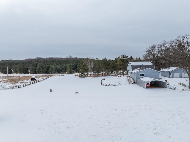 view of yard layered in snow