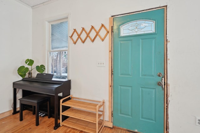 foyer entrance with wood finished floors