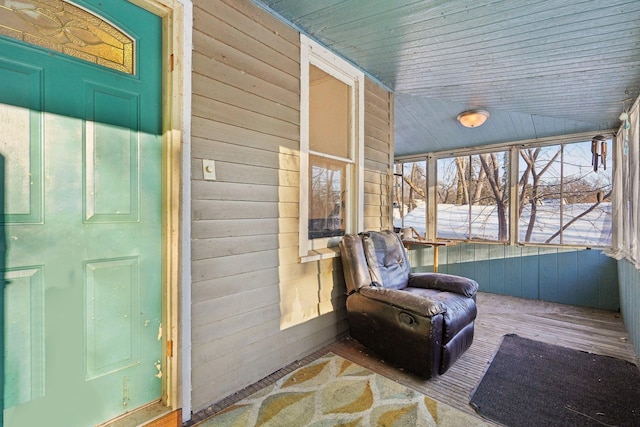 sunroom / solarium with wood ceiling