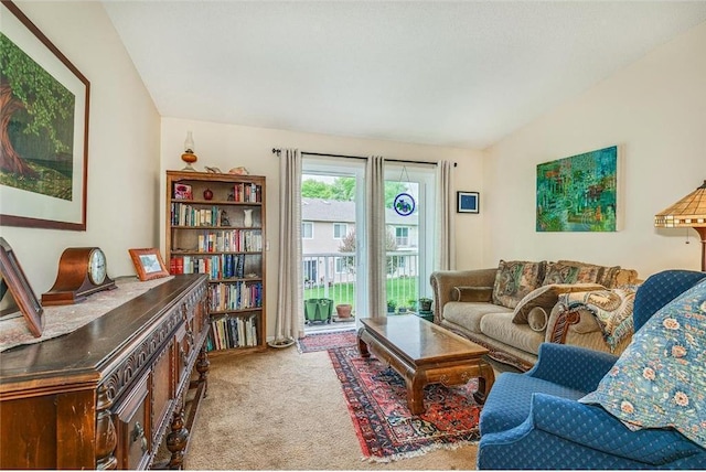 living room with light carpet and lofted ceiling