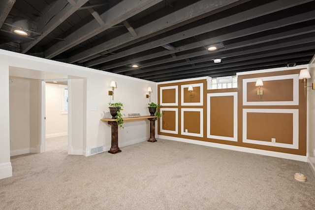 basement featuring carpet floors