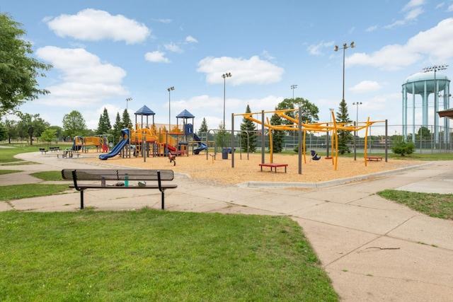 view of play area featuring a lawn