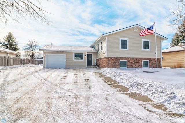 view of front of property with a garage