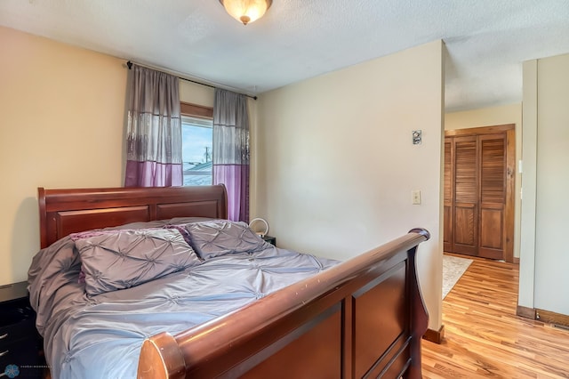 bedroom featuring light hardwood / wood-style floors