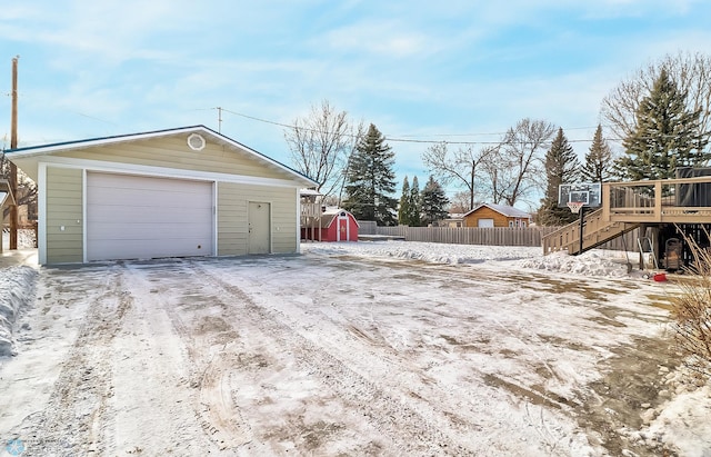 view of snow covered garage