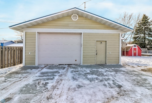 view of snow covered garage